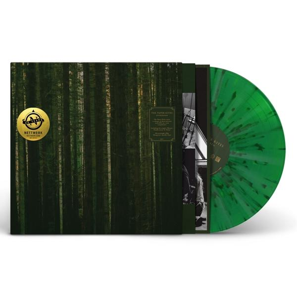 Grüne Schallplatte mit Cover. Die Platte ist grün, das Cover zeigt Wald.
