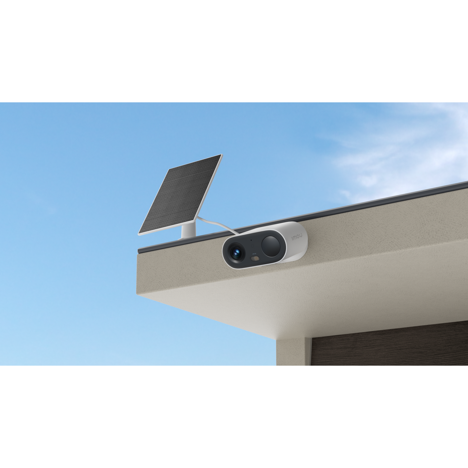 A white security camera and solar panel mounted on a building's edge under a blue sky.