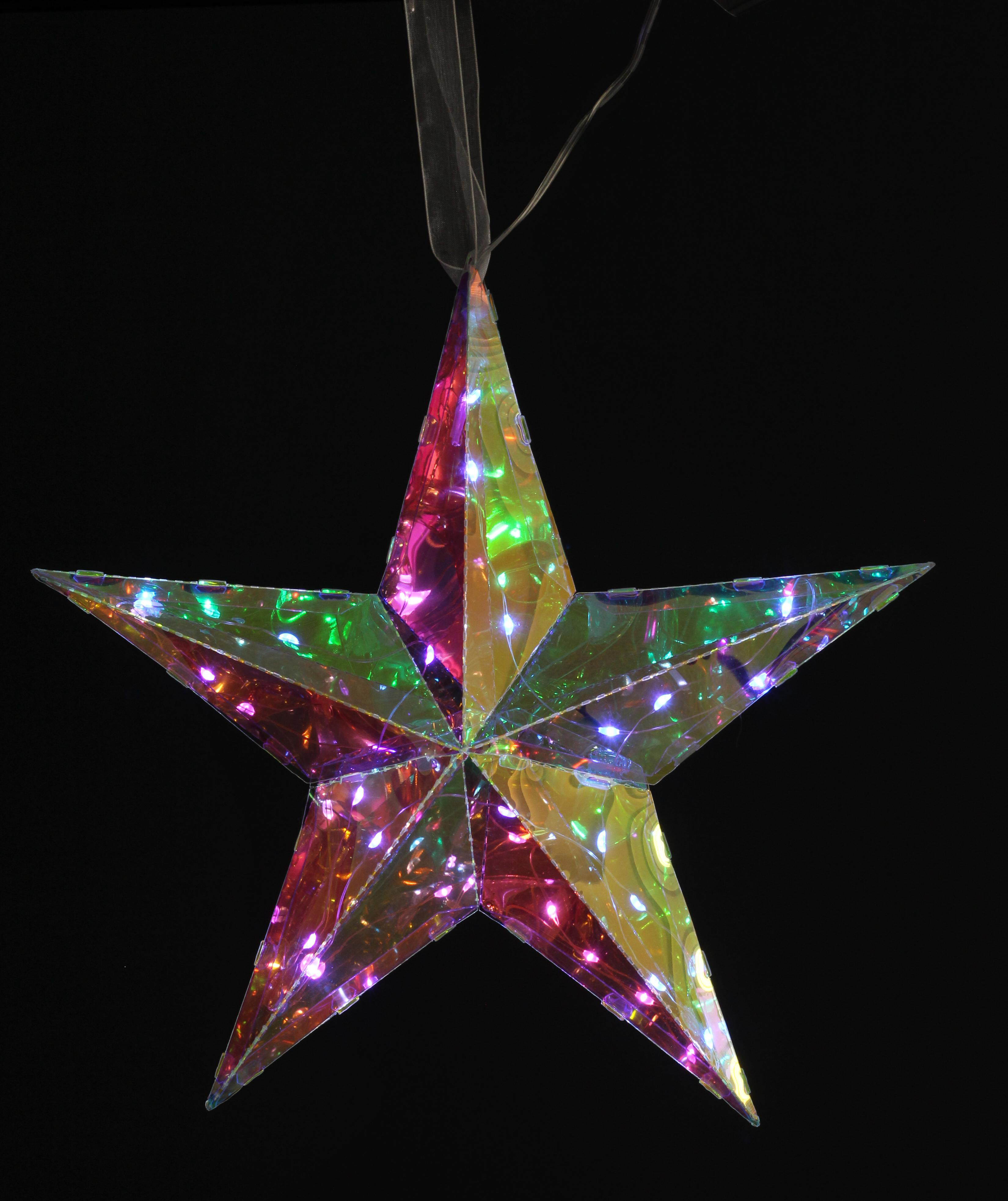 Schillernder Stern-Weihnachtsschmuck vor schwarzem Hintergrund.