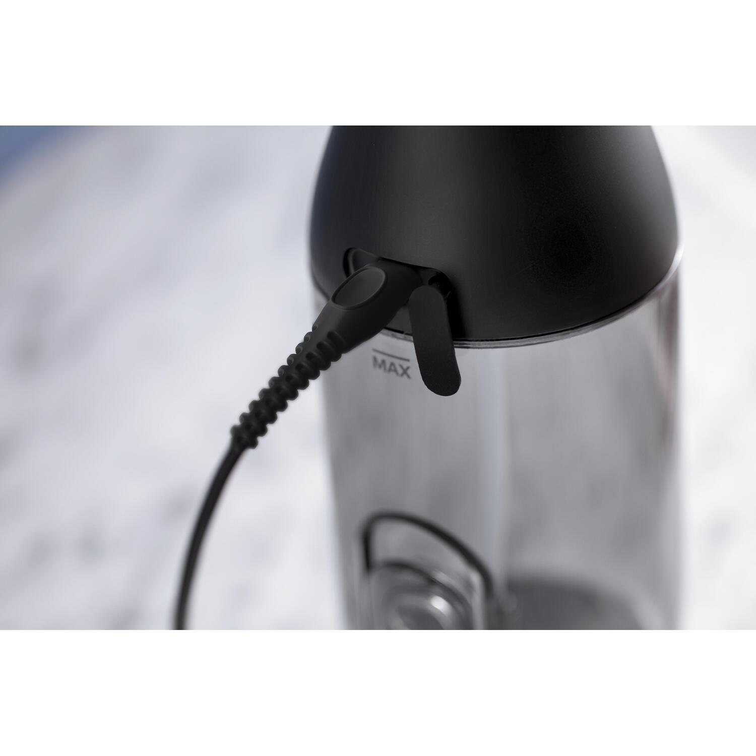 A black and transparent water bottle with a black charging cable.