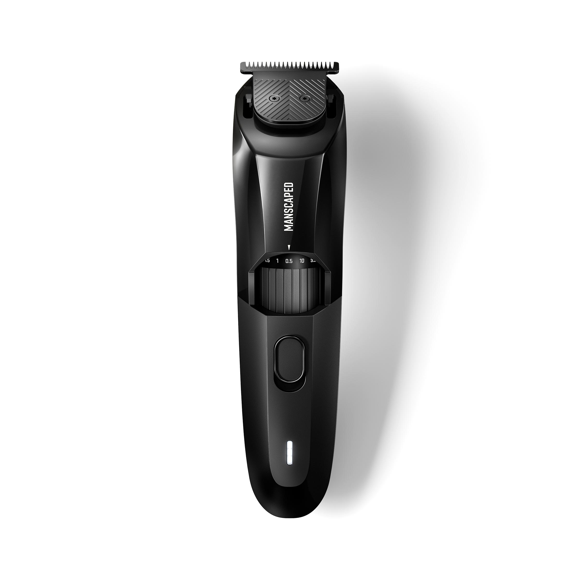 Ein schwarzer Manscaped-Trimmer, Draufsicht, mit einstellbaren Einstellungen. Es ist auf weißem Hintergrund.