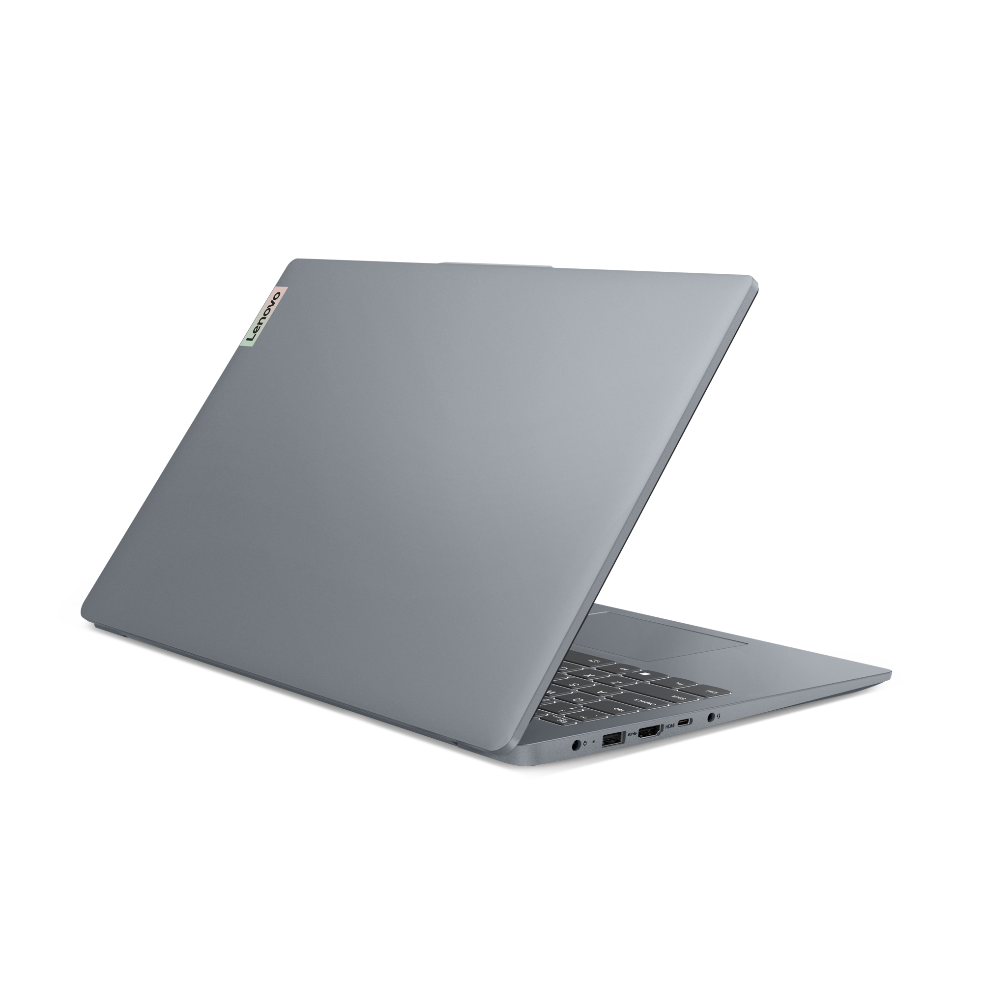 Ein grauer Laptop auf einer schwarzen Oberfläche, aus leicht erhöhter Perspektive betrachtet.