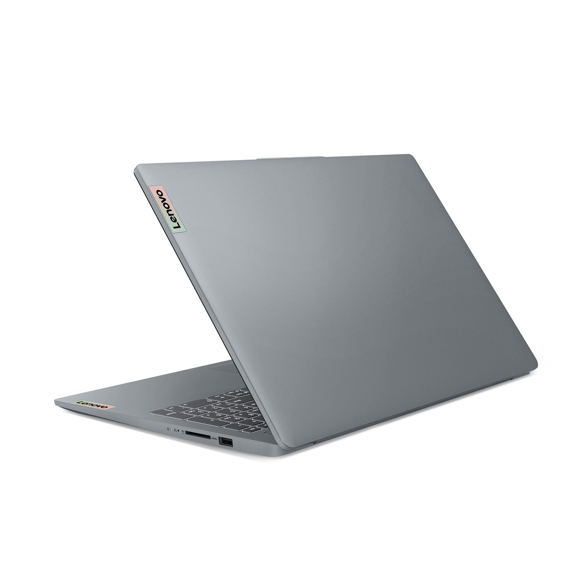 Ein graues Lenovo-Laptop, geöffnet und abgewinkelt, vor schwarzem Hintergrund. Das Lenovo-Logo ist sichtbar.