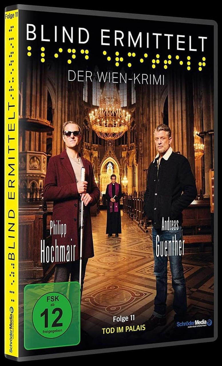 Ein Bügelbrett mit floralem Bezug und schwarzem Gestell.