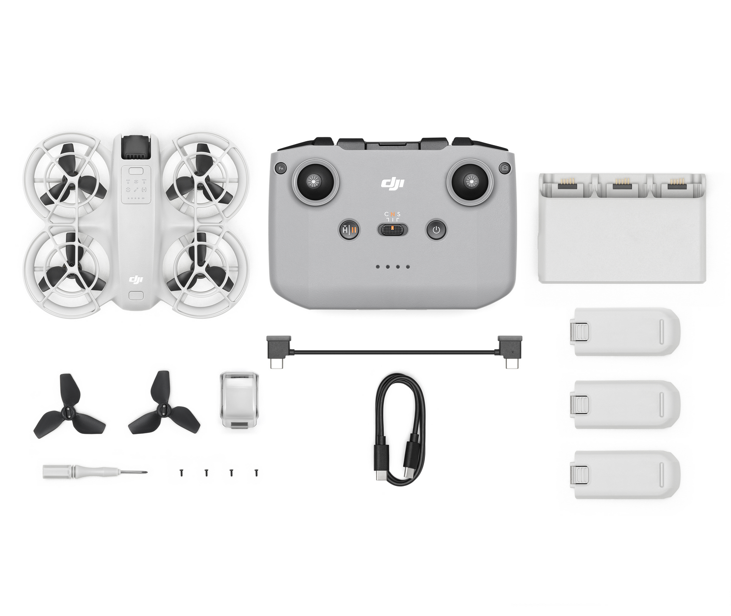 Kit de dron DJI, que incluye dron, control remoto, baterías, cargador y accesorios.