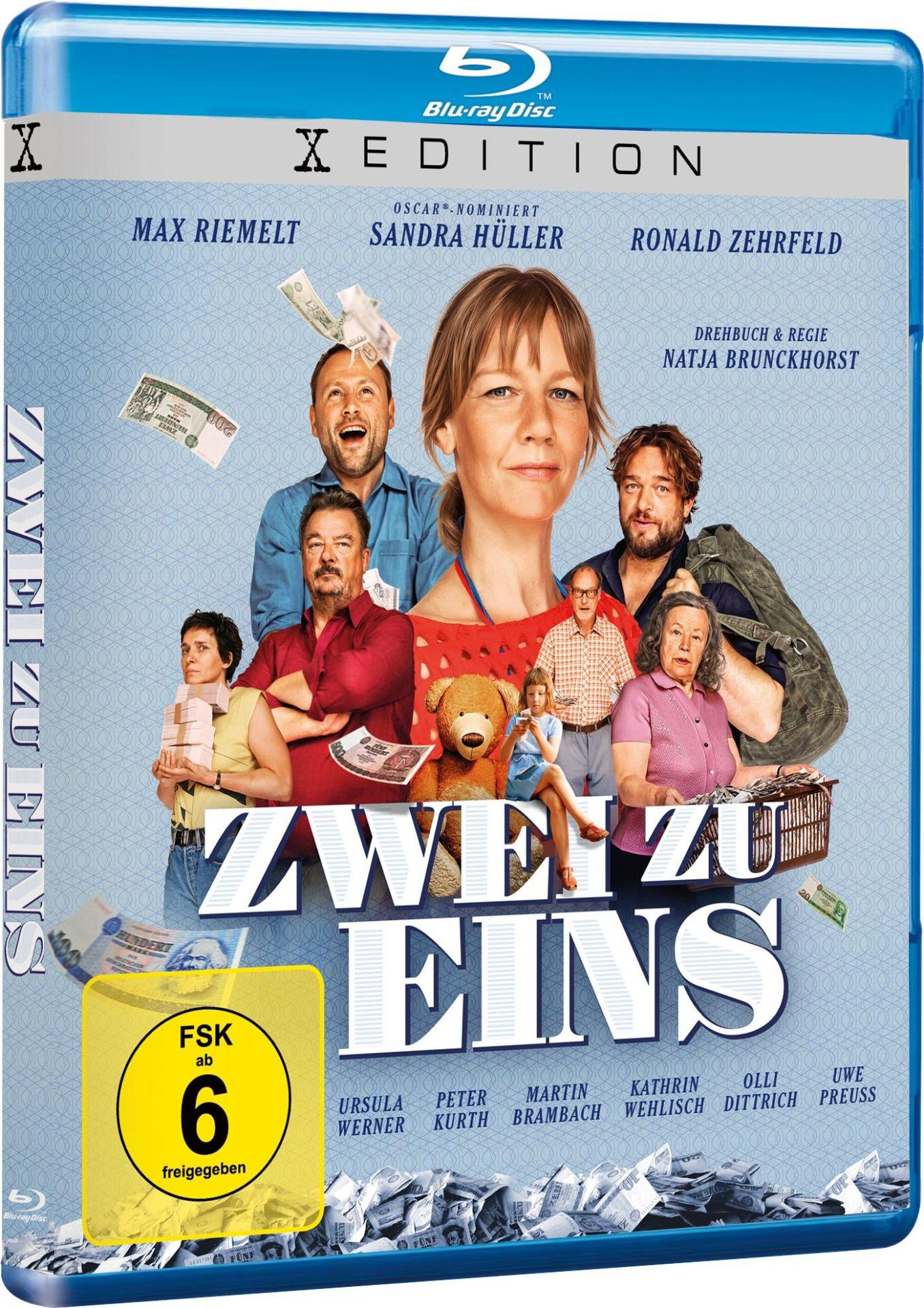 Ein Filmcover mit einer Gruppe von Personen und Text auf Deutsch. 'ZWEI ZU EINS' ist der Titel.