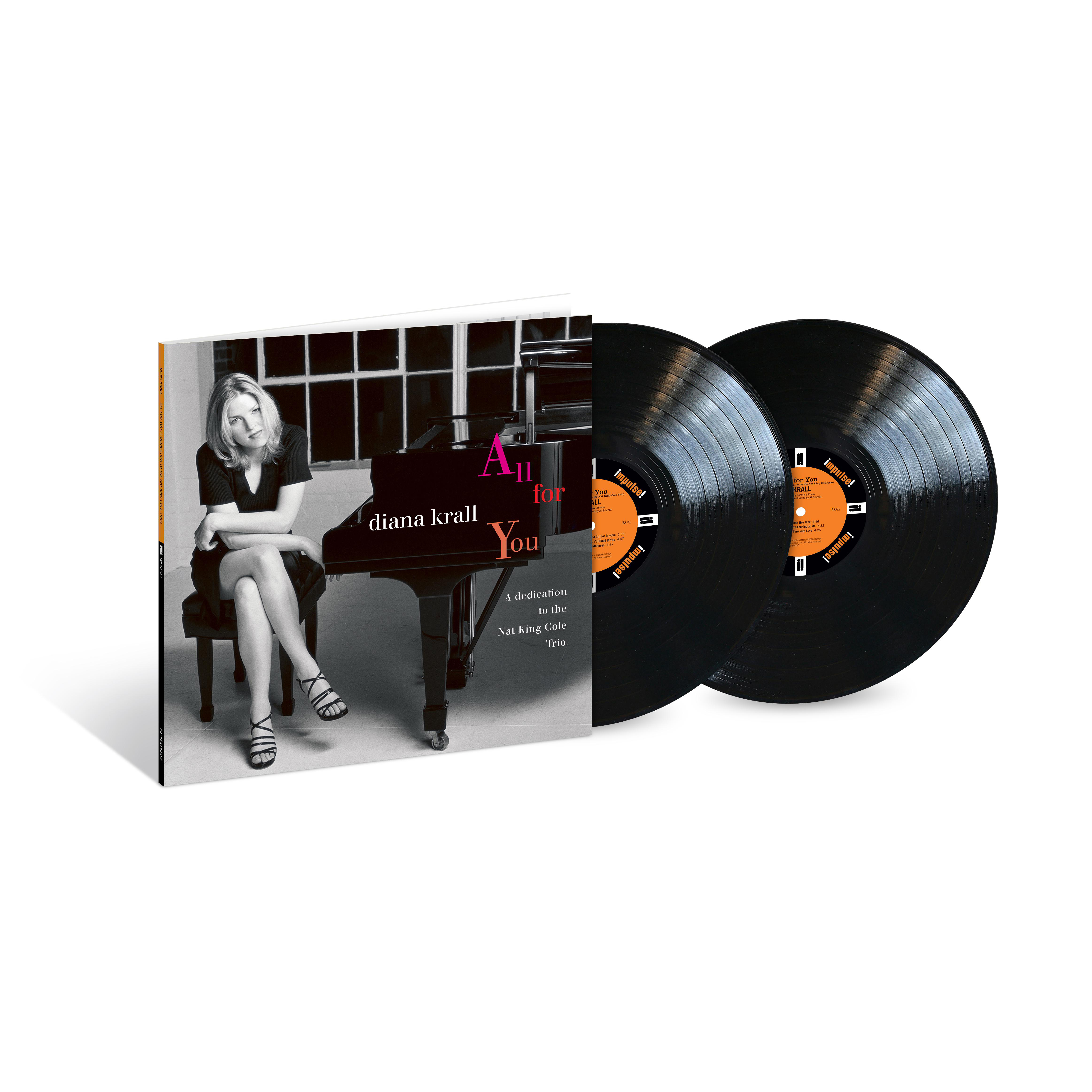 Albumcover und zwei schwarze Vinylplatten von Diana Kralls 'All for You'.