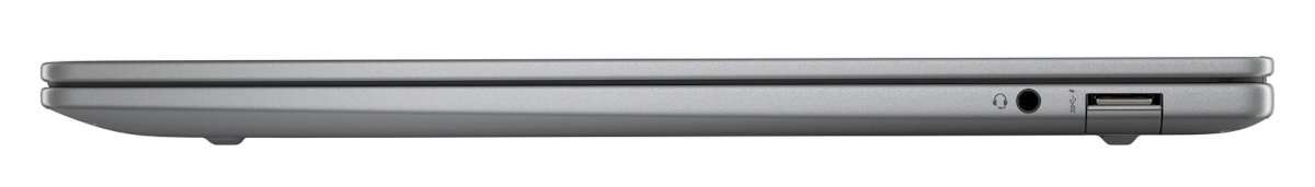 Srebrny profil boczny laptopa z portami słuchawkowymi i USB.