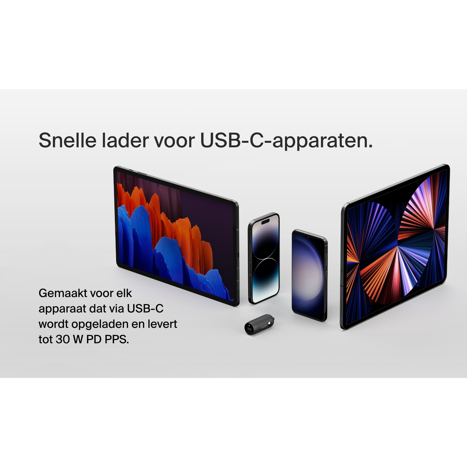 Meerdere apparaten, waaronder tablets en telefoons, worden opgeladen met een zwarte oplader. De tekst geeft snel opladen aan.