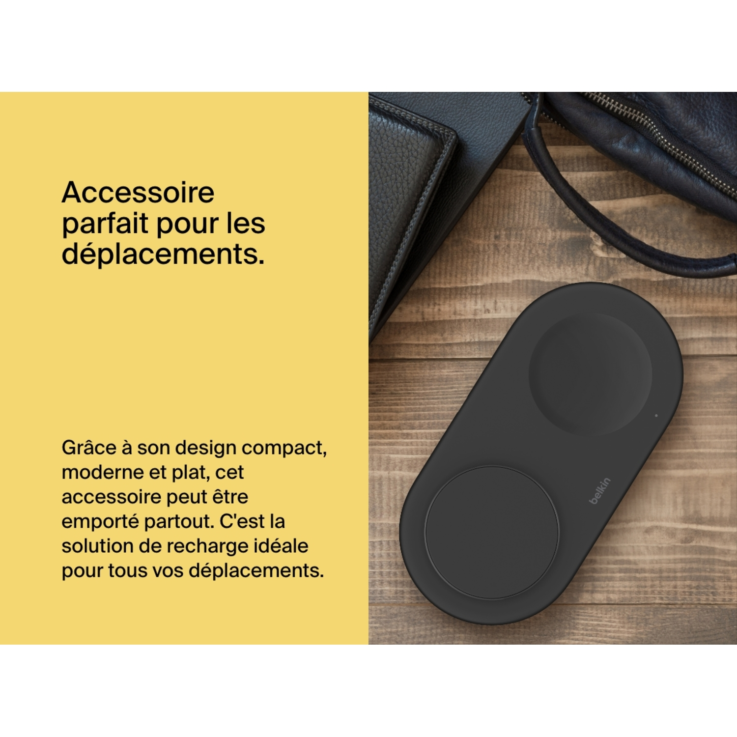 Un socle de chargement sans fil noir avec deux points de chargement est montré sur une surface en bois.