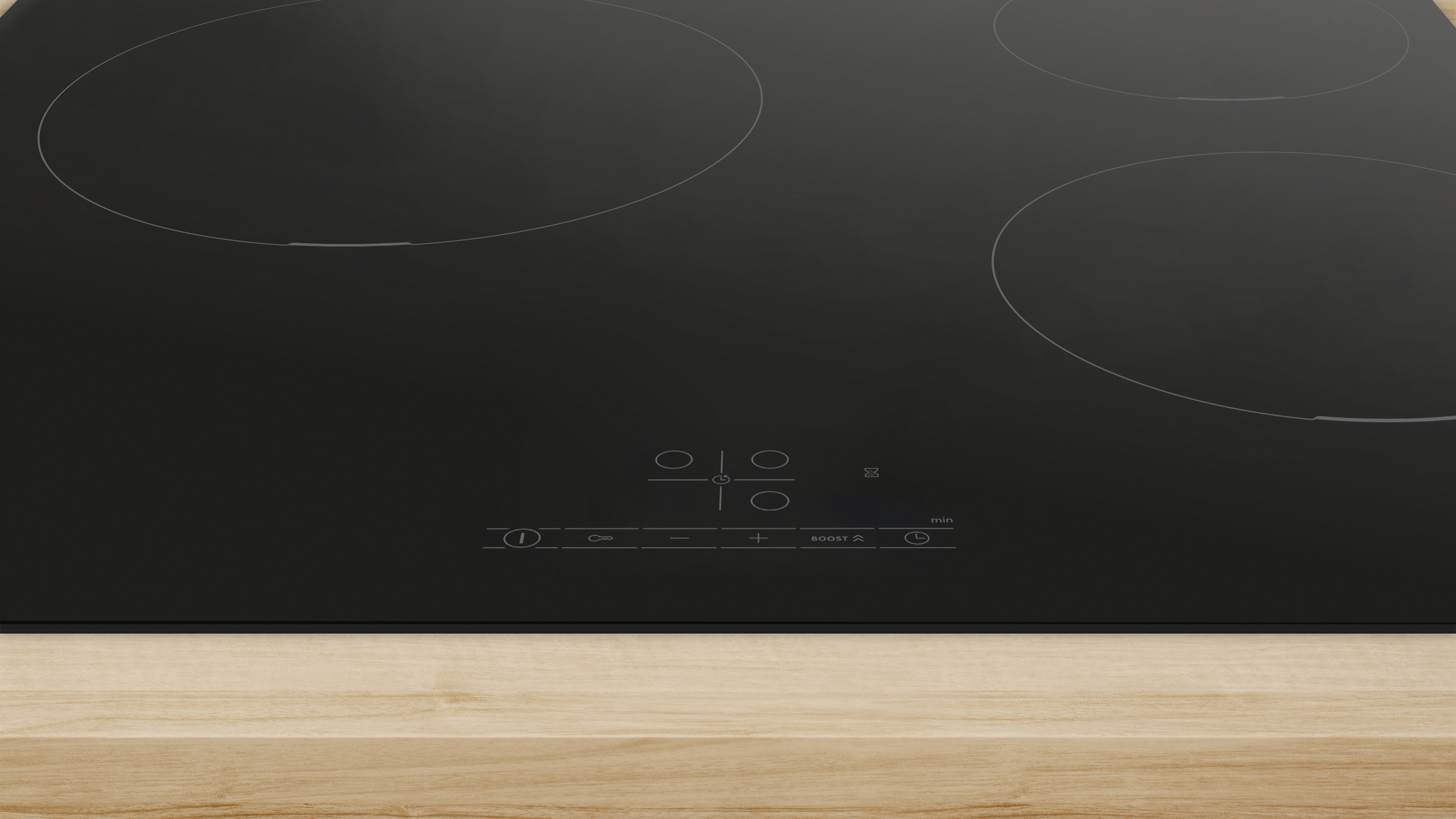Placa de inducción negra con panel de control y tres zonas de cocción sobre superficie de madera.