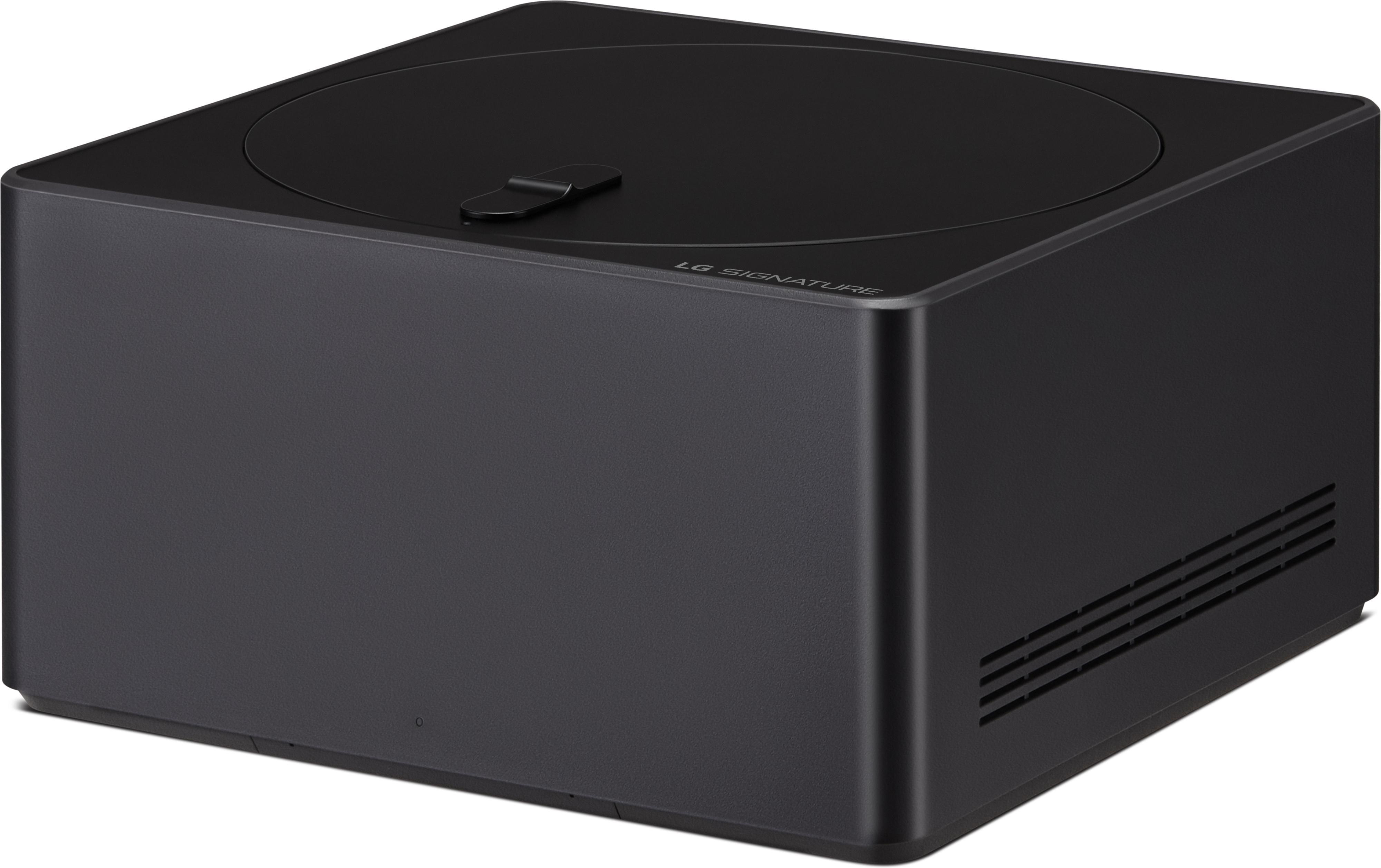 Eine schwarze quadratische Box mit abgerundeter Oberseite und einem Griff. Auf der Vorderseite steht LG SIGNATURE.