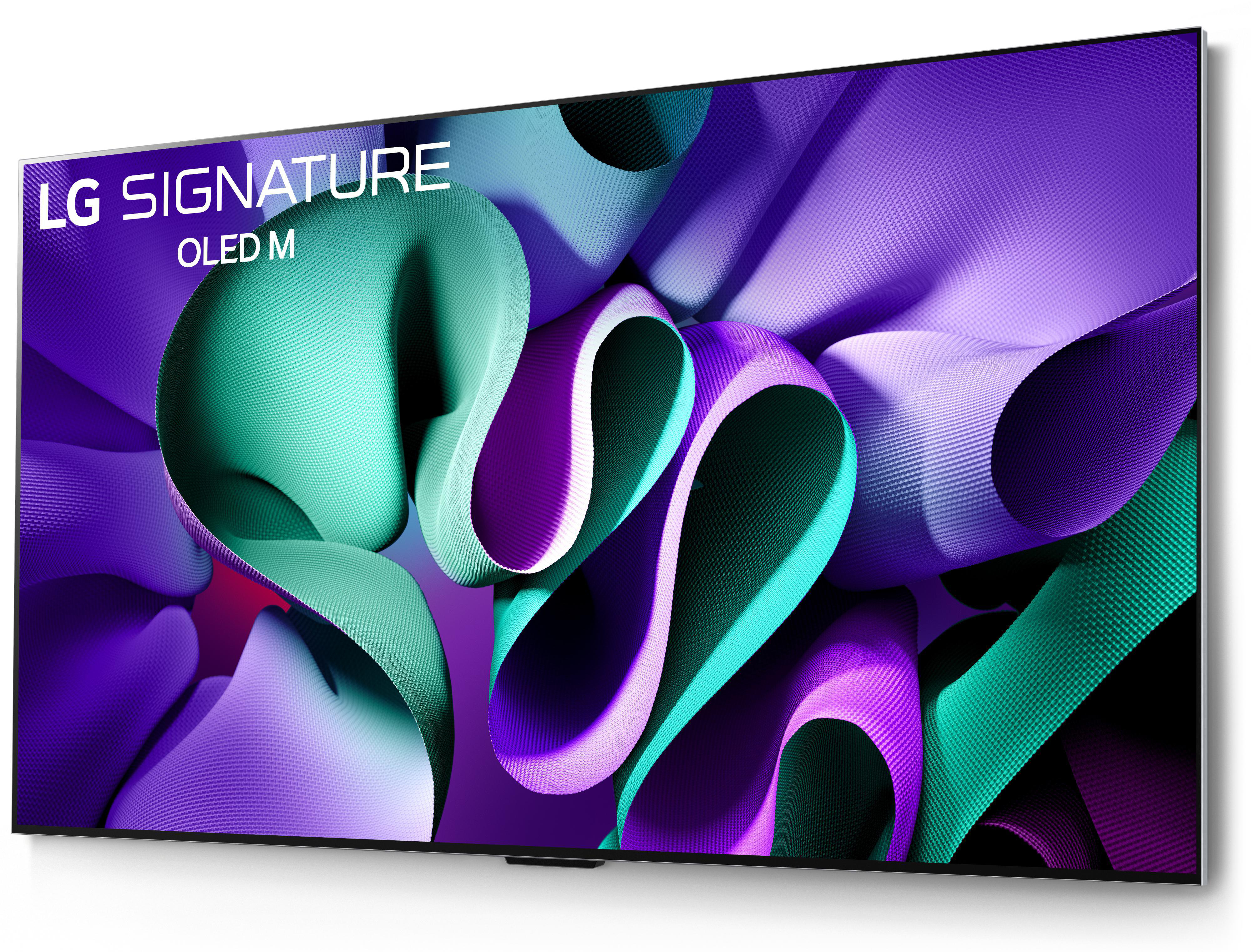 LG SIGNATURE OLED M Fernseher. Großer Bildschirm mit abstraktem lila und grünem Design.