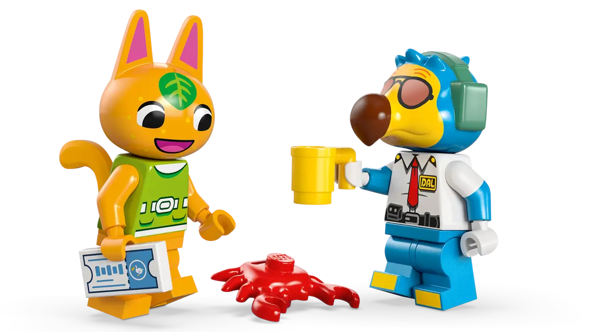 Figurki LEGO. Pomarańczowy kot, niebieski ptak, krab i żółty kubek. Białe tło.