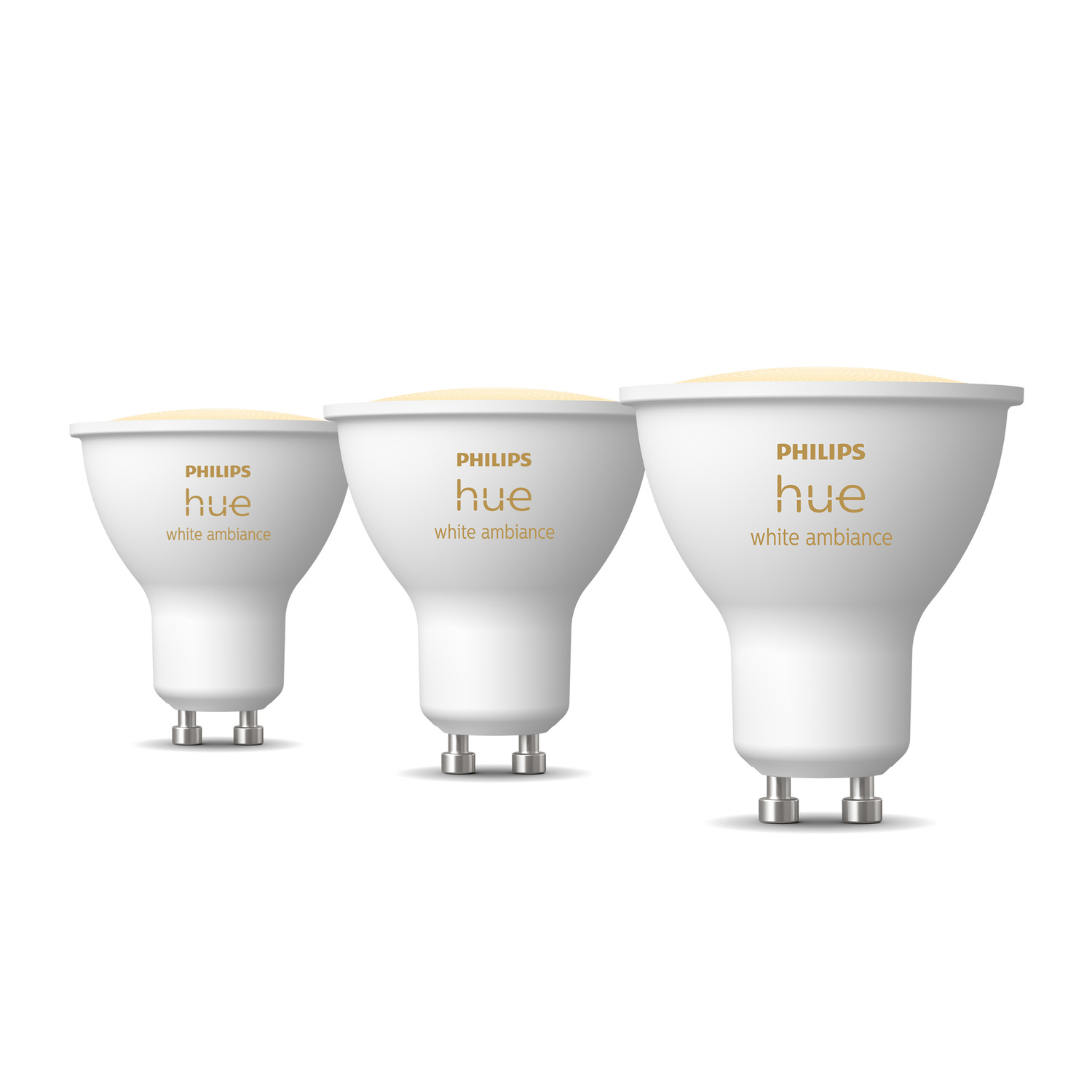 Drie witte Philips Hue slimme lampen op een witte achtergrond.
