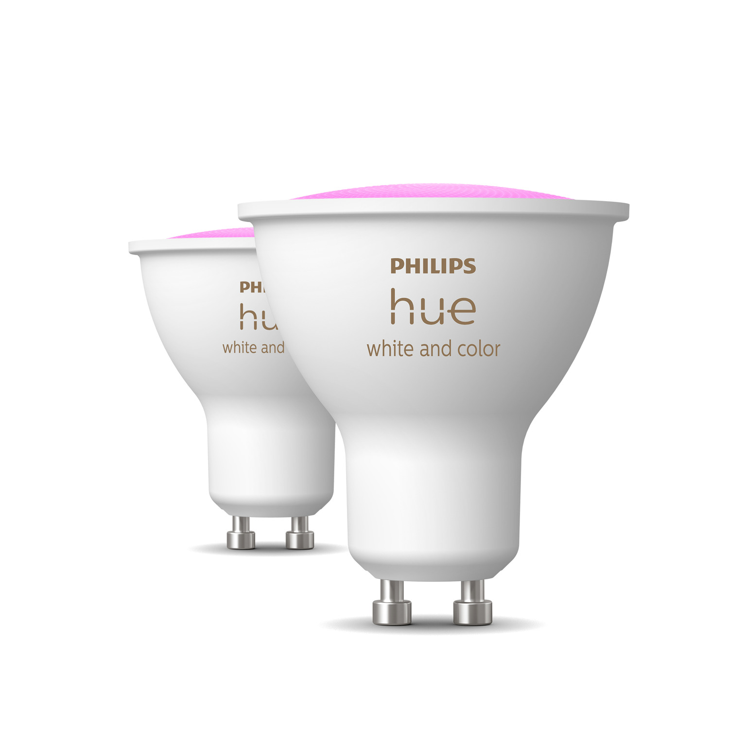 Deux ampoules intelligentes Philips Hue blanches avec des dessus roses.