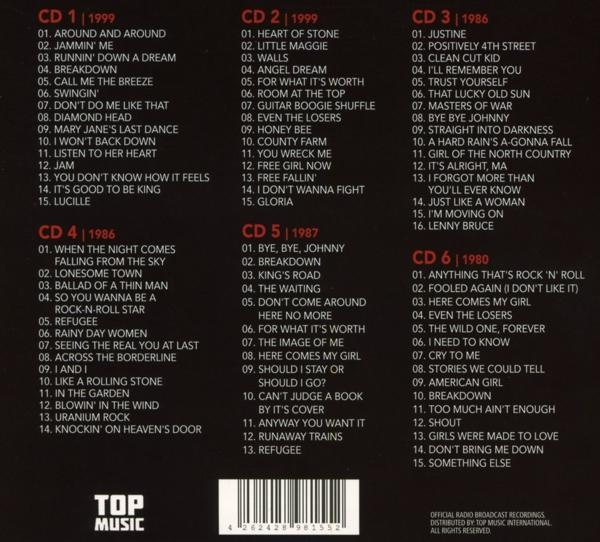 CDs mit Titellisten aus den Jahren 1999, 1999, 1986, 1987 und 1980.