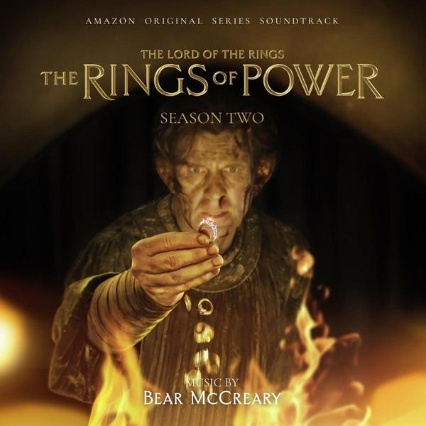 Albumcover für 'Der Herr der Ringe: Die Ringe der Macht' mit einer Figur, die einen Ring hält.