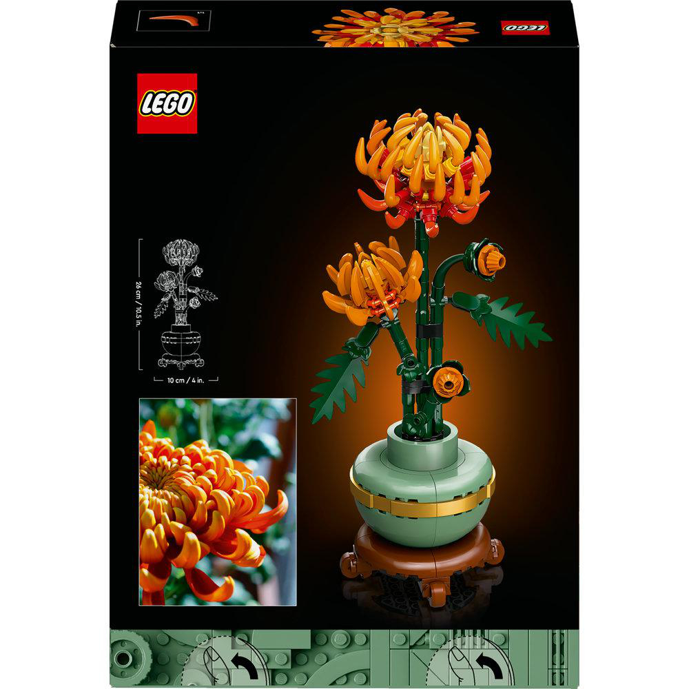 Lego-Blumenset mit orangenen Blumen und grünen Stielen in einer grünen Vase. Es ist in einer Box.