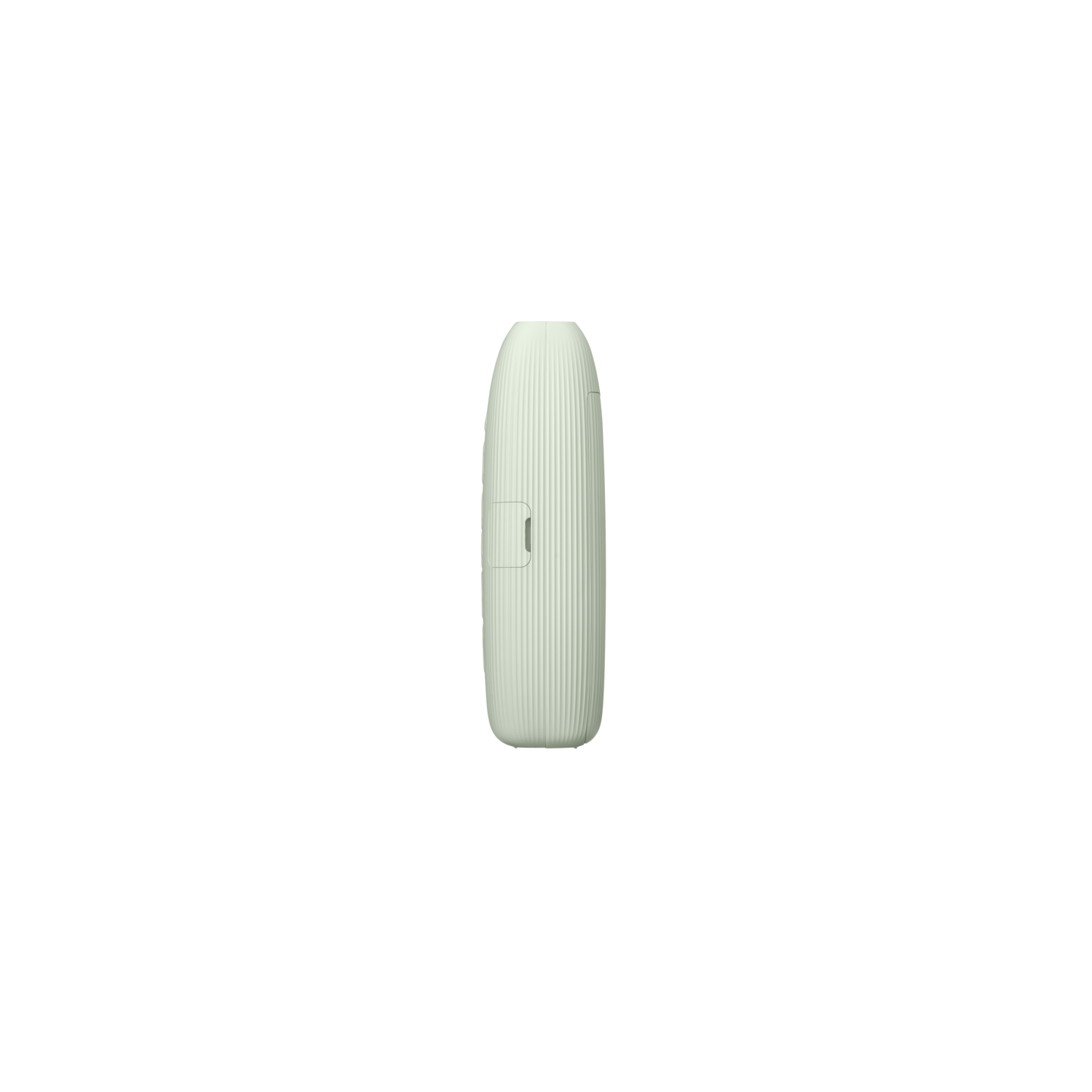 A light green object on a black background. The object appears to have a port.