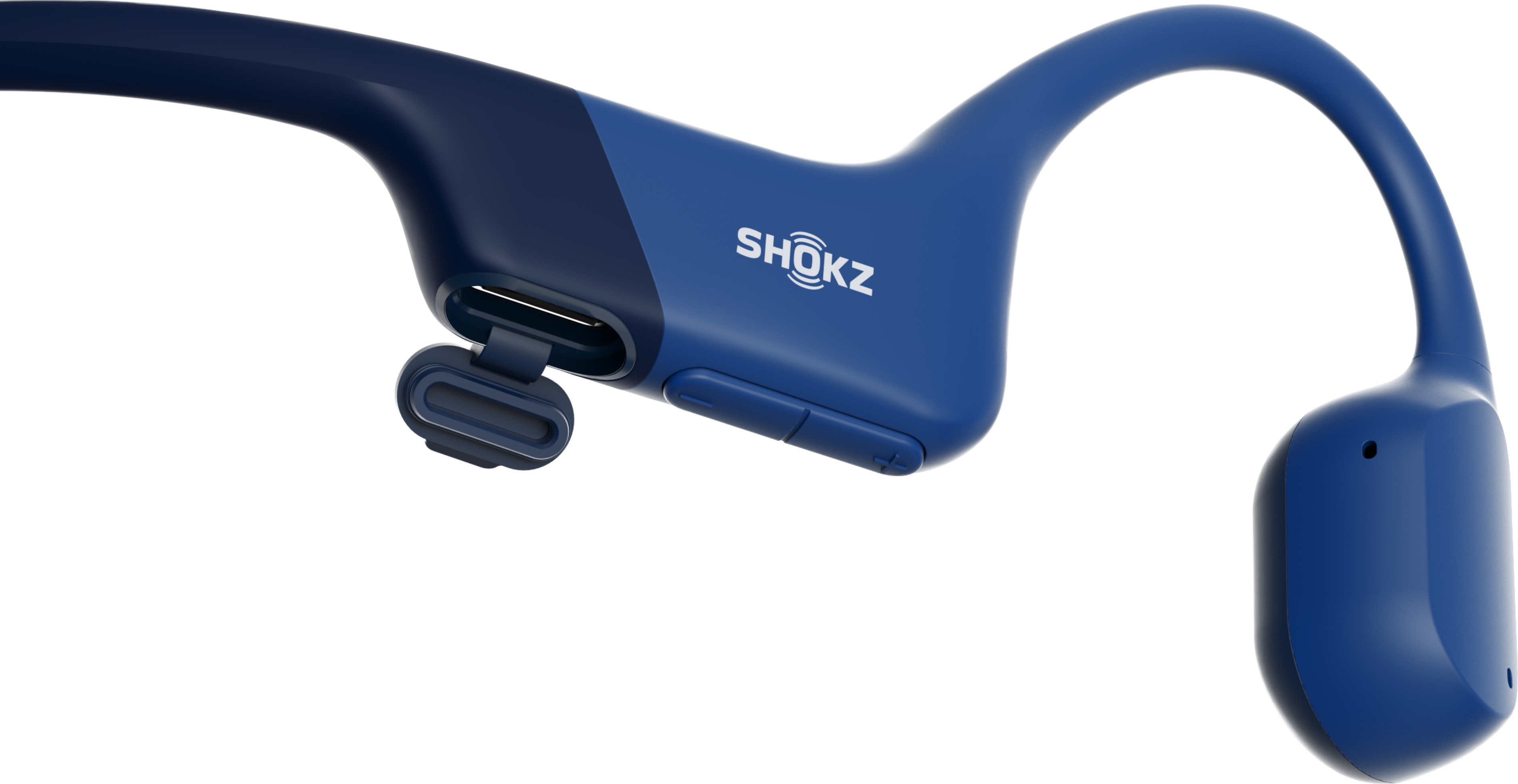 Casque à conduction osseuse Shokz bleu. Le design à oreille ouverte repose sur les pommettes.