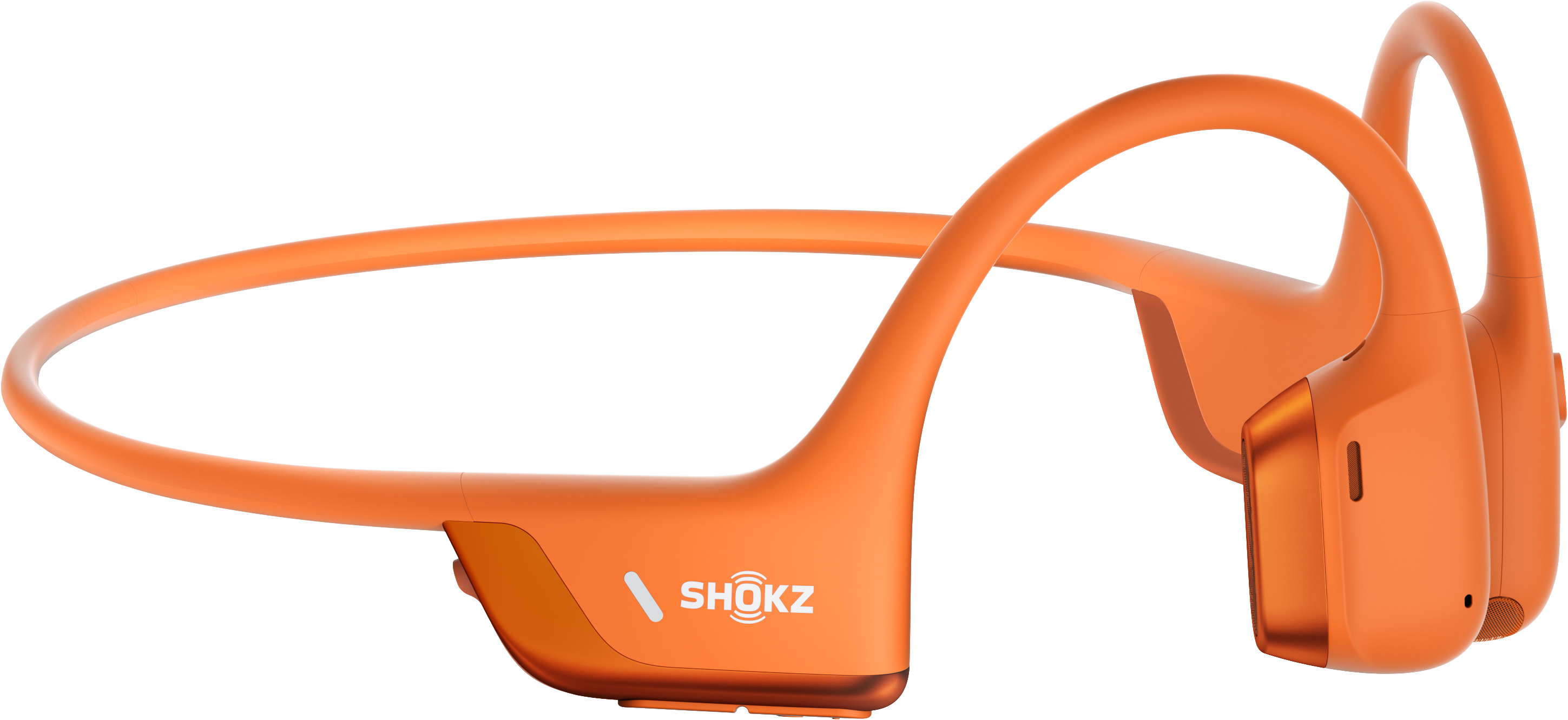 Orangefarbene Shokz Knochenschallkopfhörer. Sie umschließen die Ohren und haben ein Band, das über den Kopf geht.