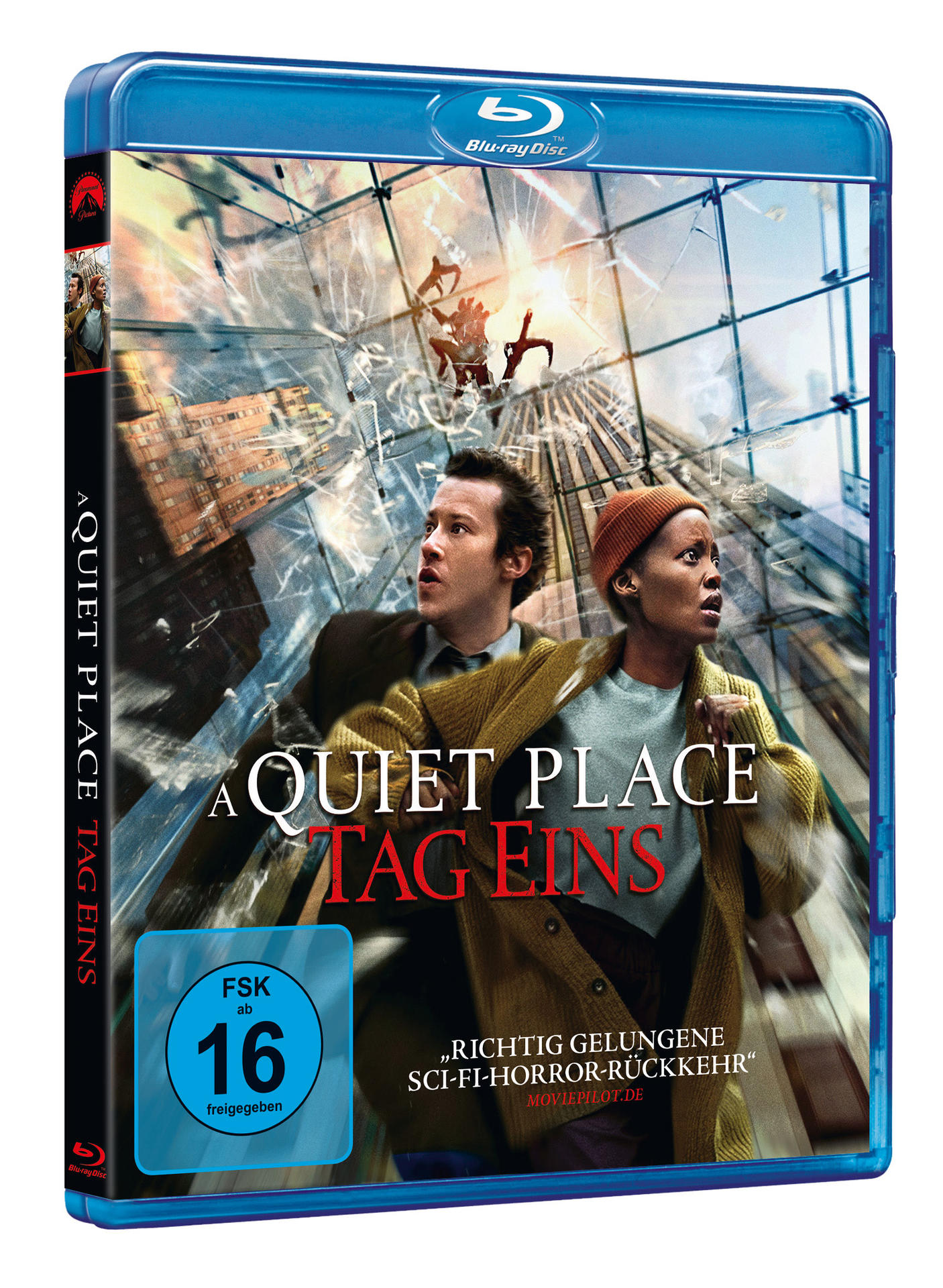 Eine Blu-ray-Hülle für A Quiet Place: Tag Eins. Zwei Personen blicken ängstlich nach oben. Deutscher Text ist sichtbar.
