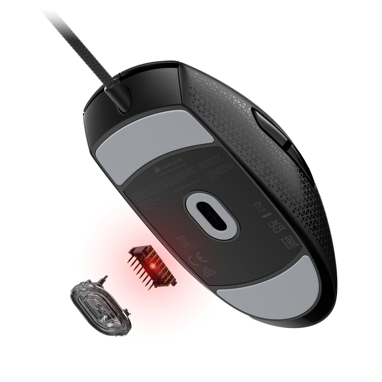 The underside of a black gaming mouse, with a red highlight.