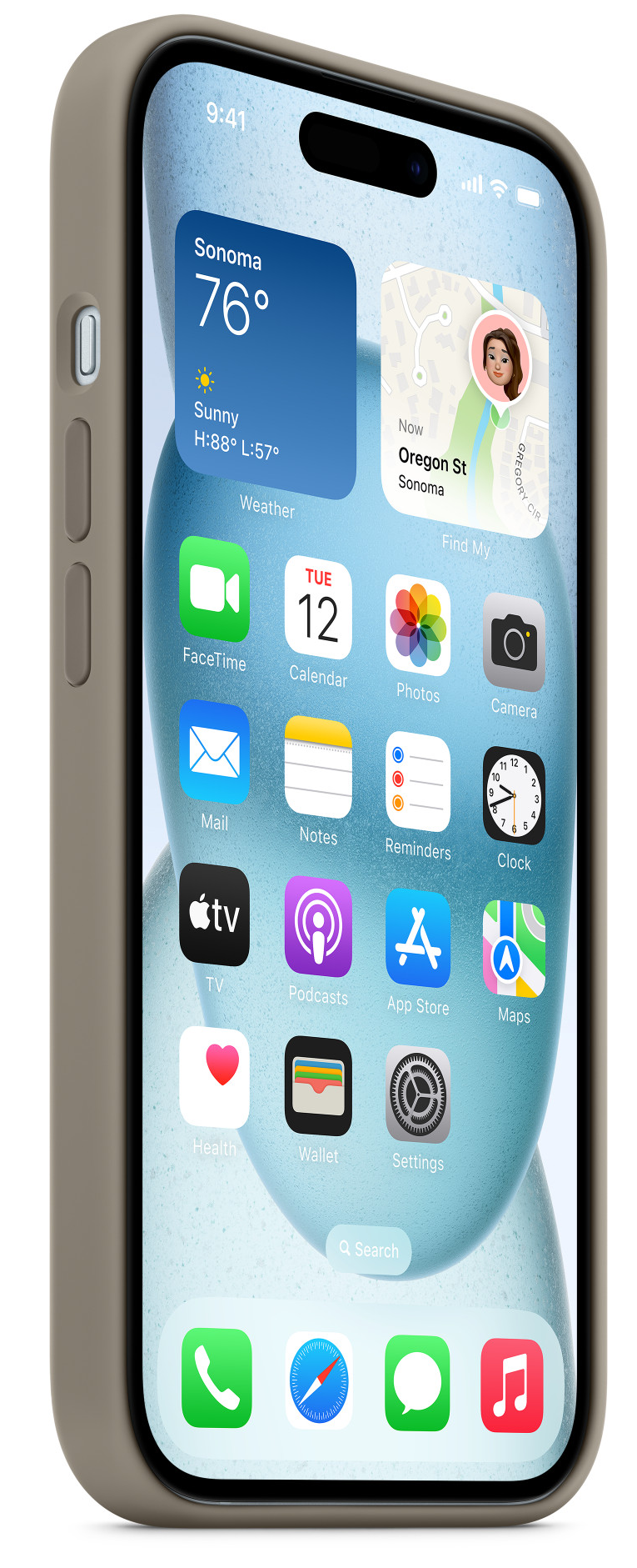 iPhone tokban, a kezdőképernyővel, dátummal, idővel, időjárással és alkalmazásikonokkal.