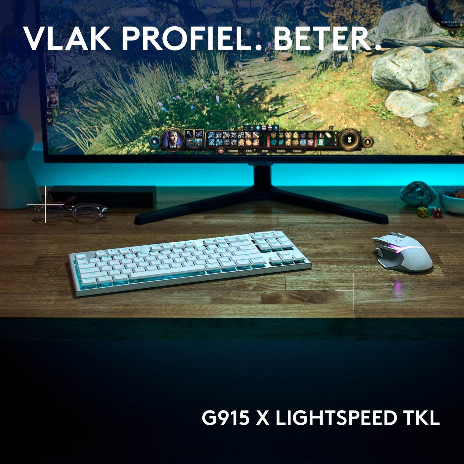 A white keyboard and mouse sit on a wooden desk with a monitor displaying a game.