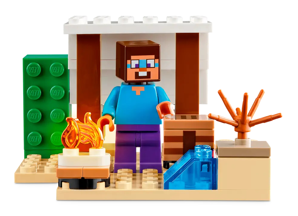 Scena Lego Minecraft: Steve stoi przed chatą Lego z ogniem.