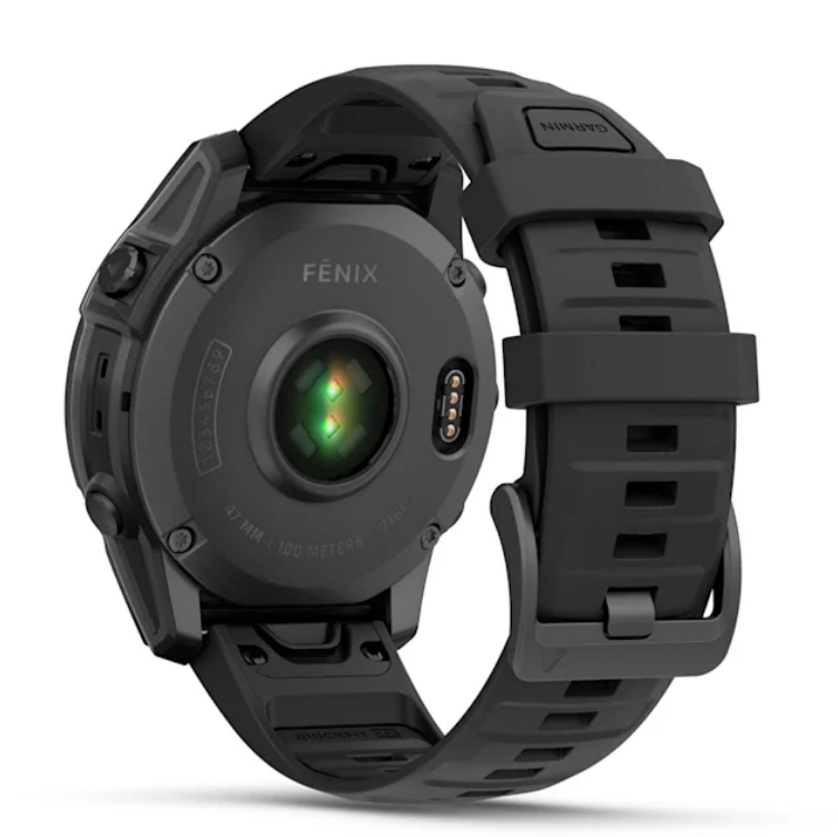 Czarny zegarek Garmin Fenix, widok z tyłu, pokazujący czujniki i pasek.