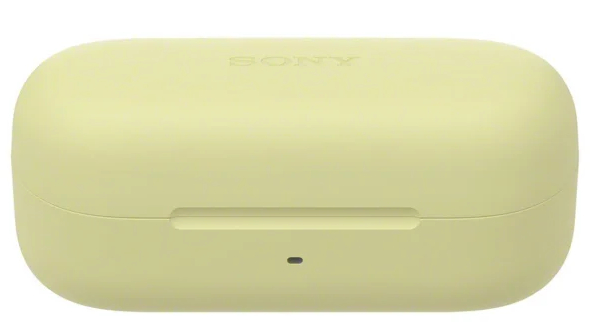 Para żółtych bezprzewodowych słuchawek w żółtym etui ładującym. Etui jest zamknięte.