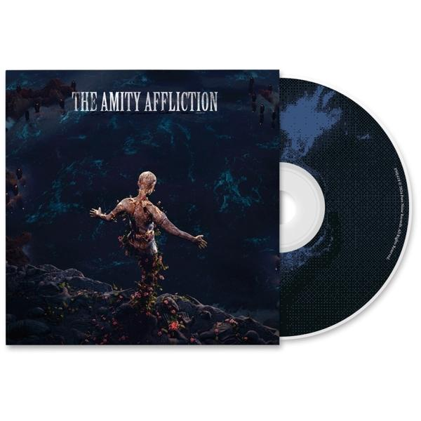 CD-Cover mit Personenstatue auf Felsformation und CD rechts.