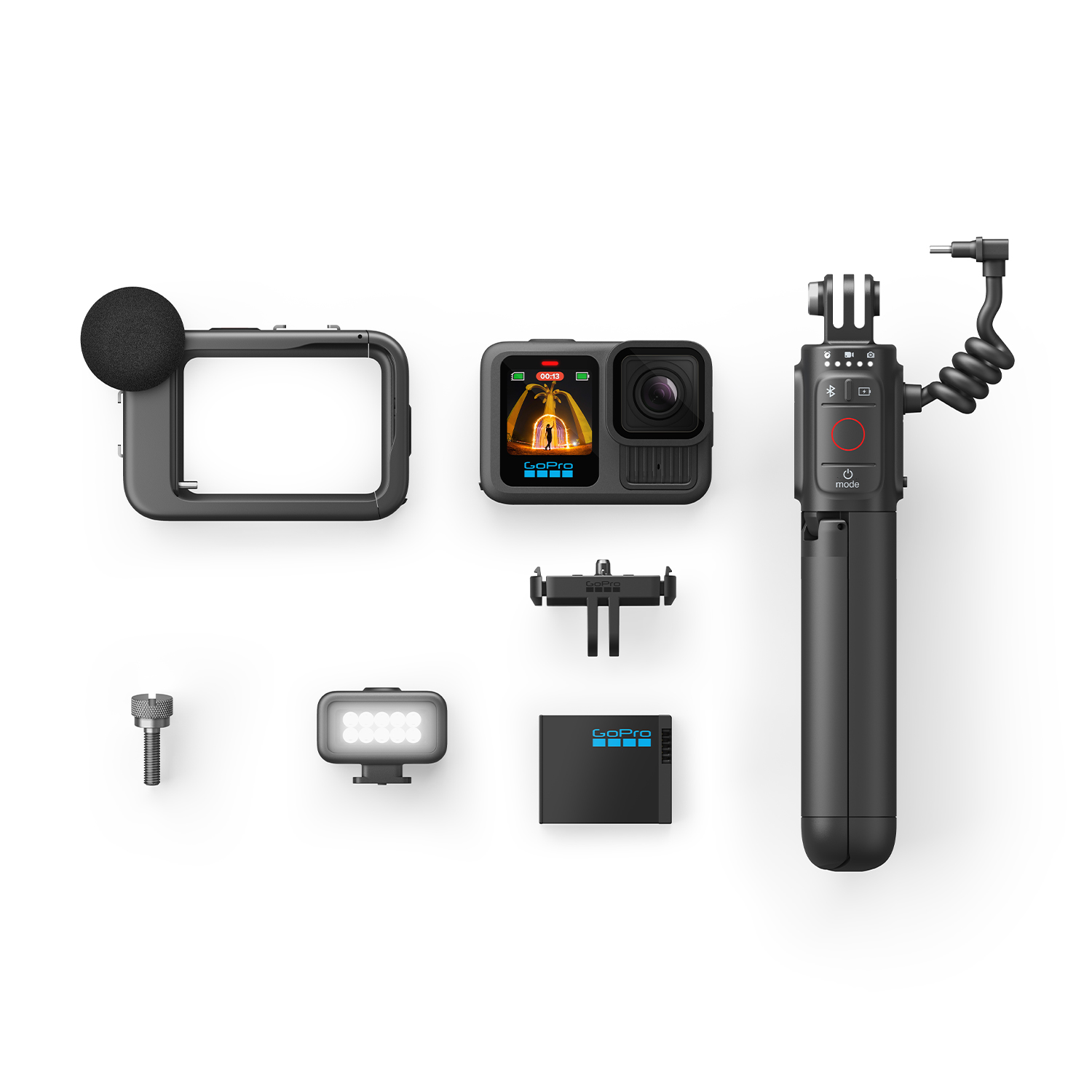 Una fotocamera GoPro con accessori, tra cui una cornice, una luce e un'impugnatura con pulsanti.