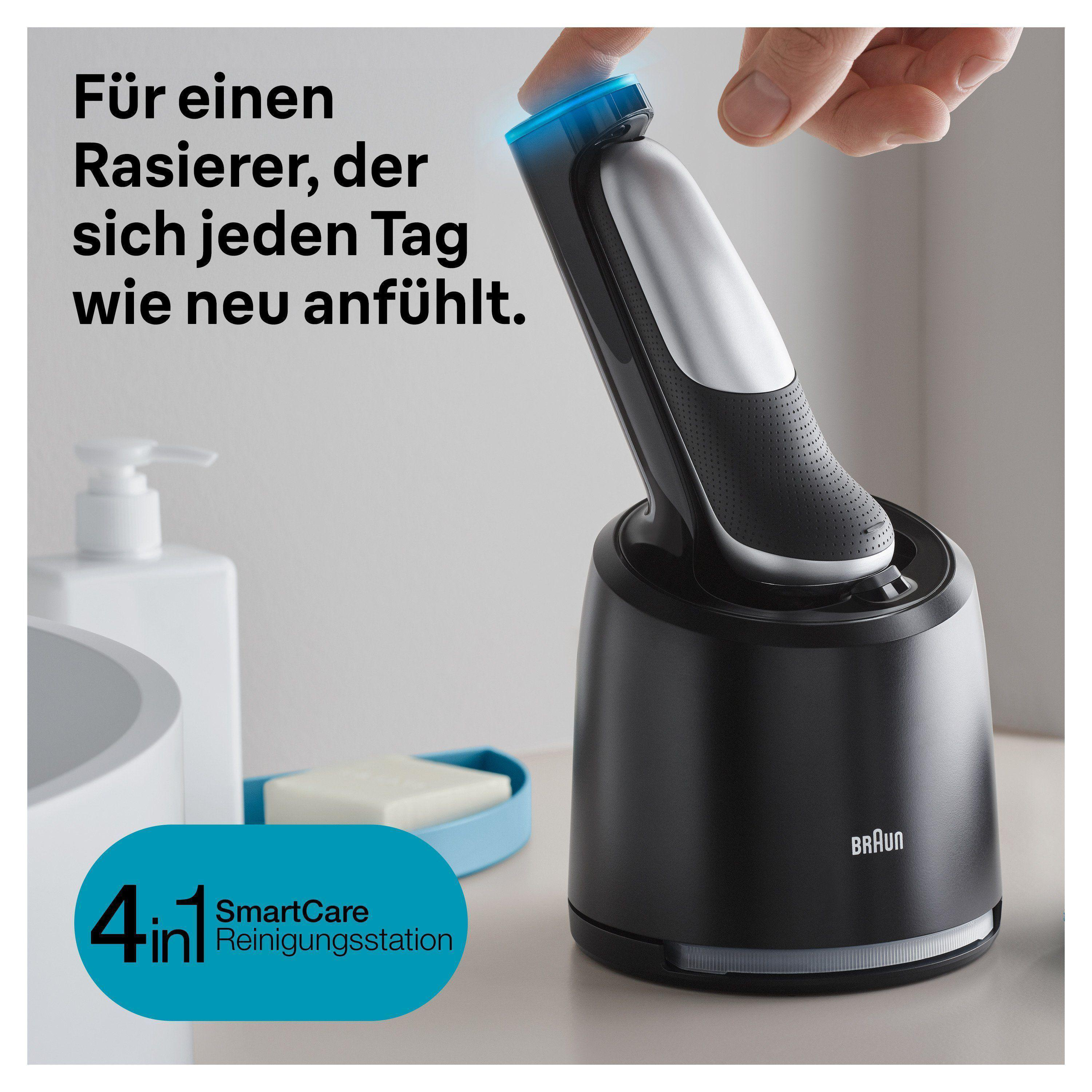 Ein Braun-Rasierer mit seiner Reinigungsstation. Eine Hand scheint den Rasierer hineinzulegen.