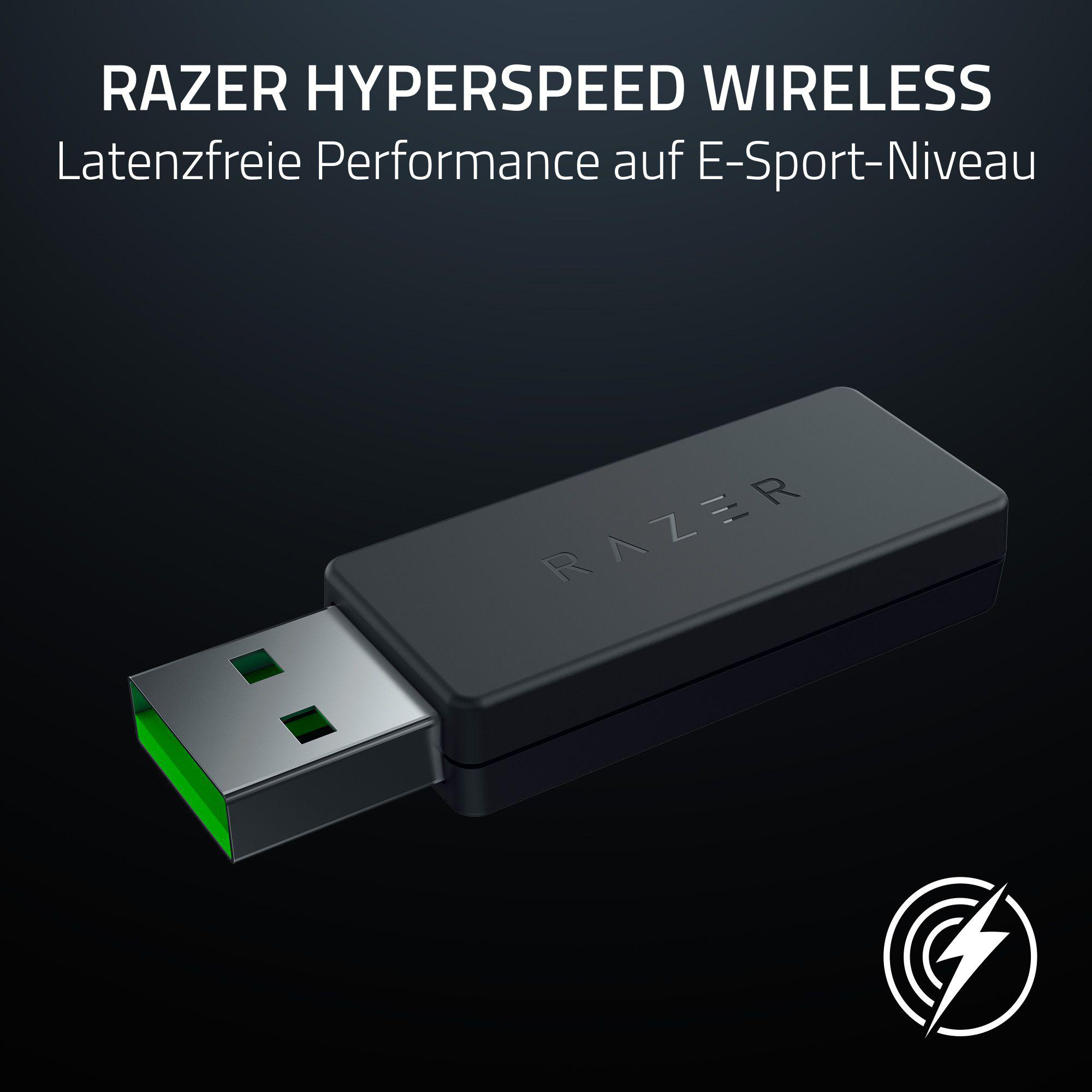 Ein schwarzer USB-Empfänger mit dem Razer-Logo und grünen Details.