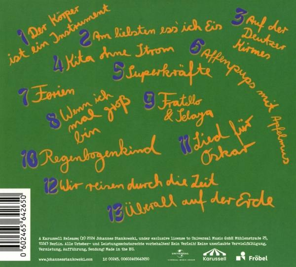 Grüner Albumrücken mit handschriftlichem Text in Grün und Lila, mit Titelliste.