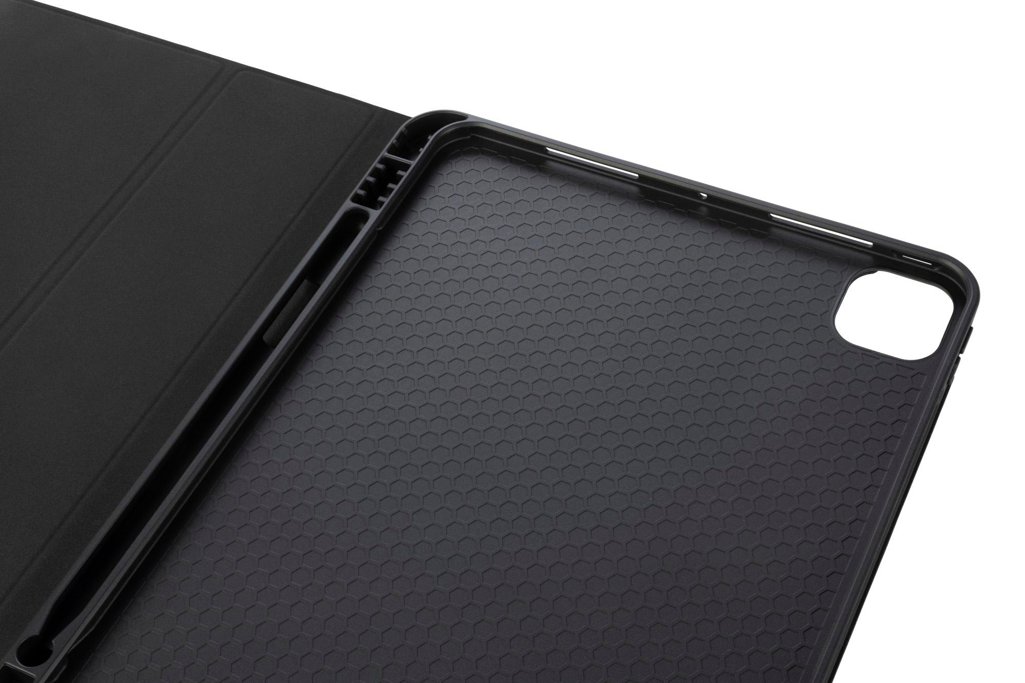 Die Innenseite einer Tablet-Hülle. Schwarz, mit Wabenmuster.