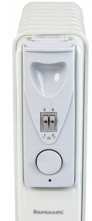 Zbliżenie białego grzejnika olejowego z widocznymi pokrętłami i przełącznikami.