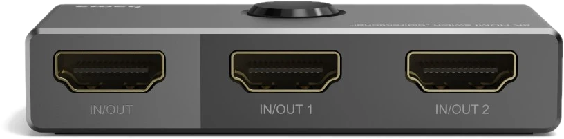 Un commutateur HDMI gris avec trois ports étiquetés IN/OUT, IN/OUT 1 et IN/OUT 2.