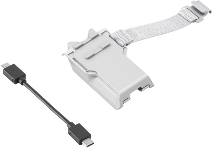 Ein weißes Drohnenzubehör mit einem Gurt und einem schwarzen USB-C-Kabel.