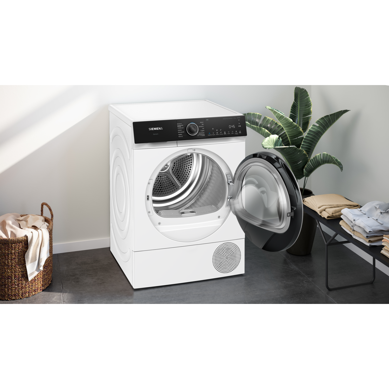 A white washing machine with the door open, a basket, and a shelf.