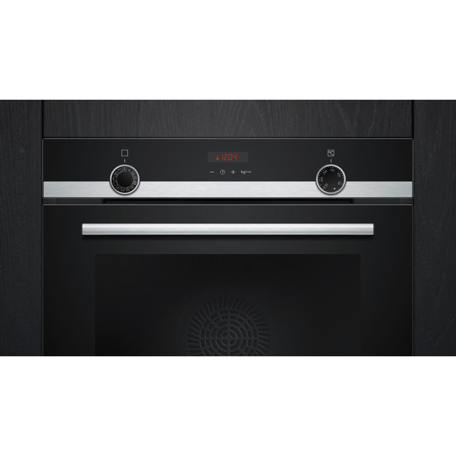 Built-in oven control panel with dials and a display showing 12:04, with a dark background.