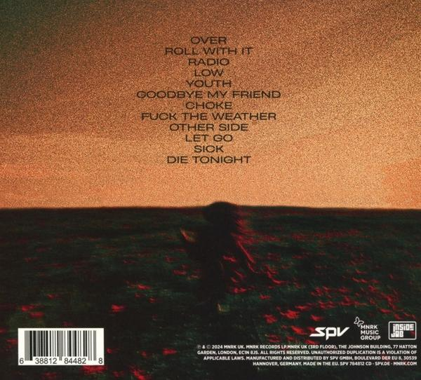 Die Rückseite einer CD-Hülle mit Texten und einer Ansicht des Meeres in Sonnenuntergangsfarben.