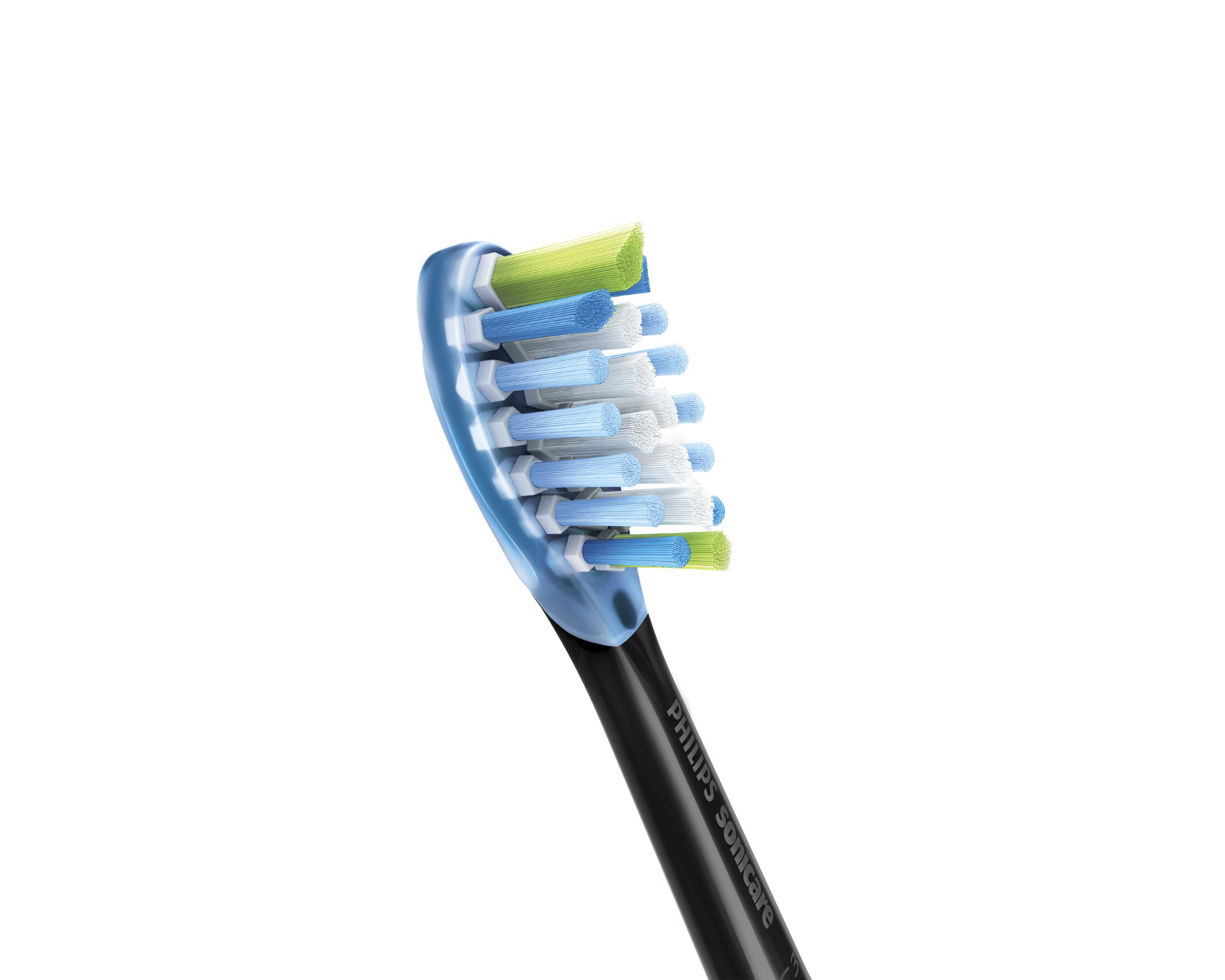 Nahaufnahme eines Zahnbürstenkopfes mit blauen, grünen und weißen Borsten.