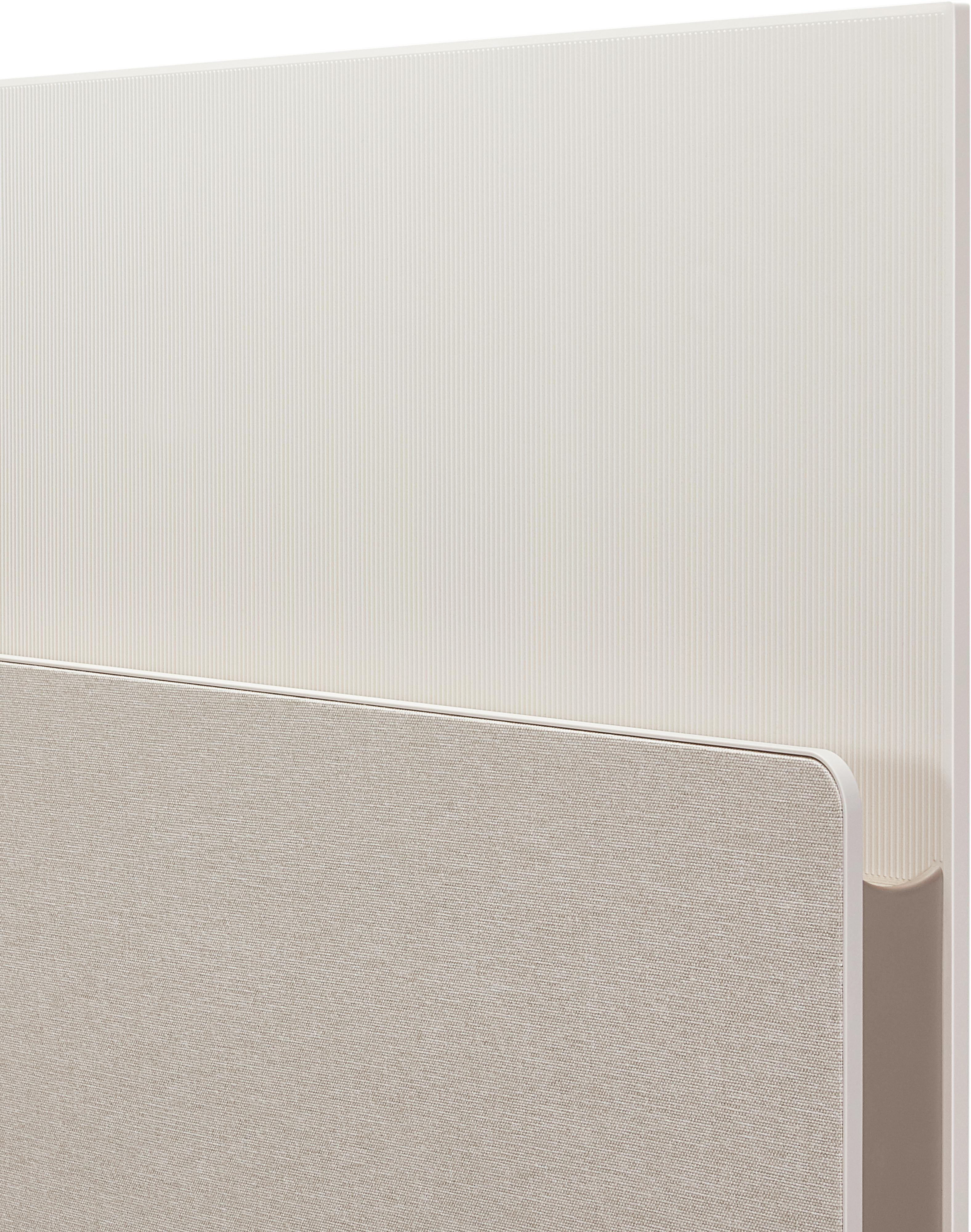 Nahaufnahme der Rückwand eines weißen und beigen LG-Fernsehers. Das Panel hat ein strukturiertes, geripptes Design.