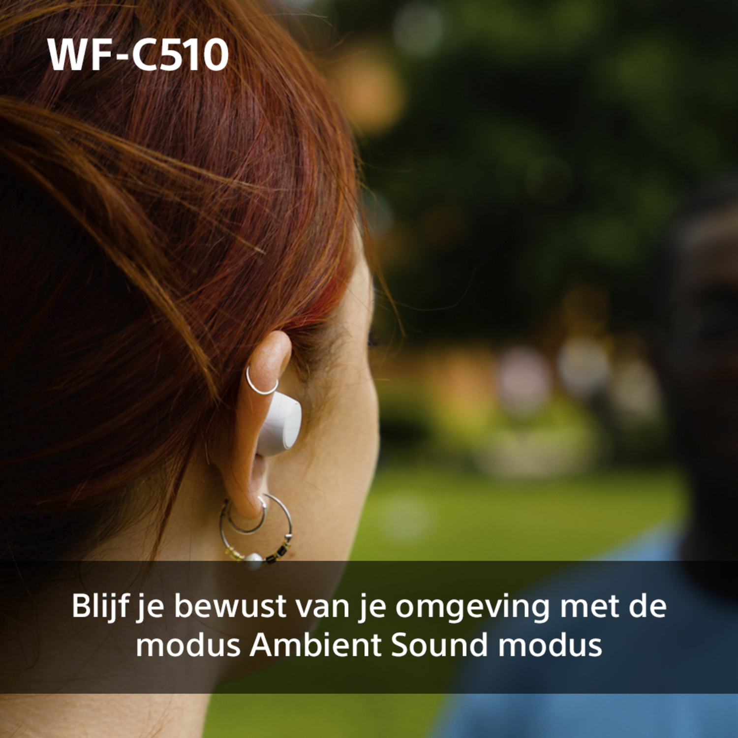 A person wearing white wireless earbuds with the text WF-C510.