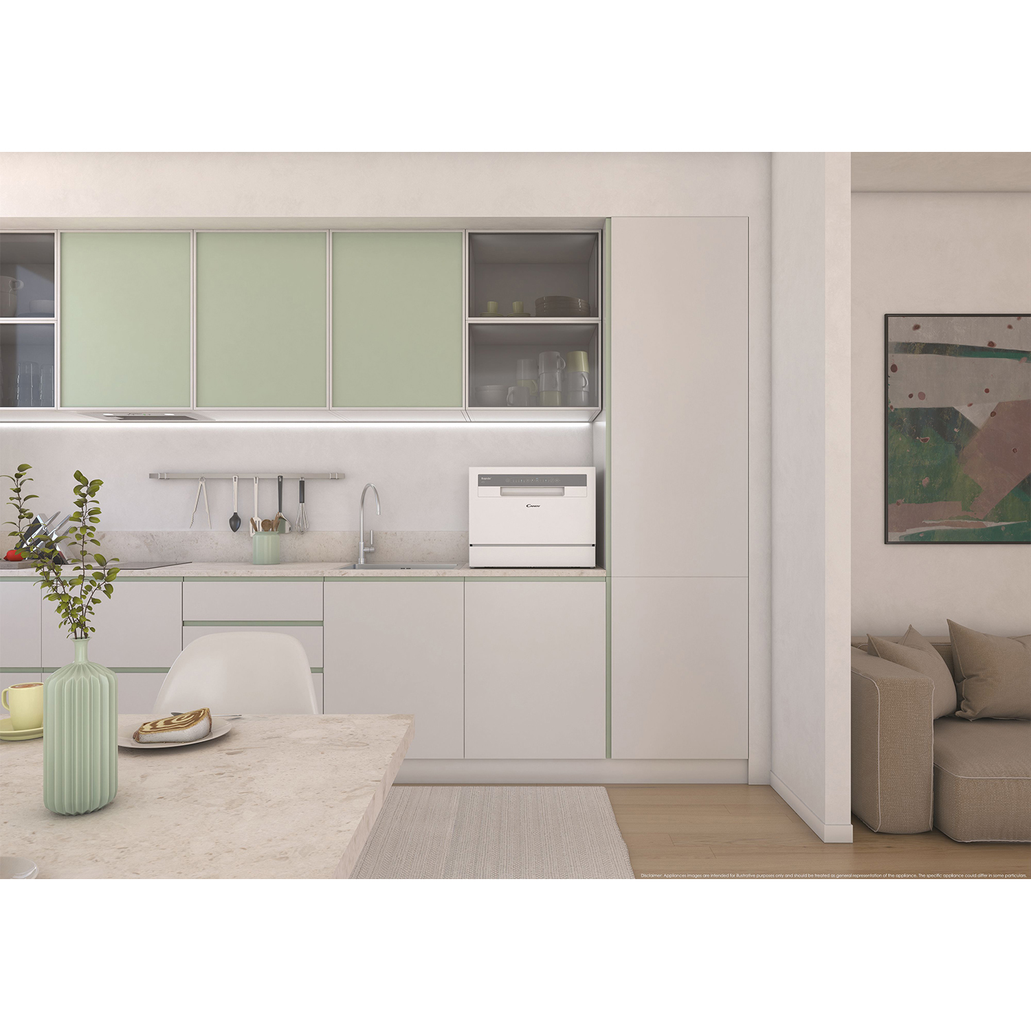 Cucina moderna con mobili verde chiaro, lavastoviglie e tavolo con vaso.