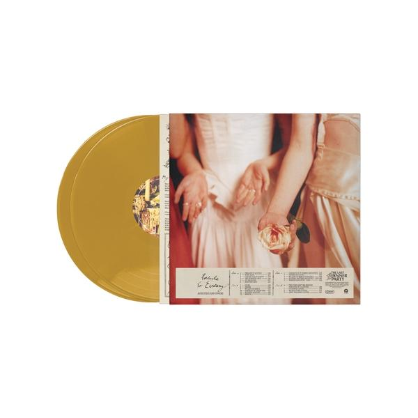 Eine goldene Schallplatte liegt neben ihrem Albumcover und zeigt eine Frau mit einer Rose.